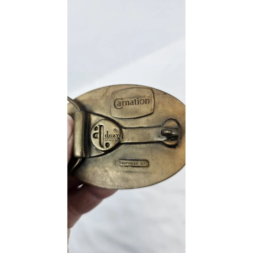 Vintage 1977 Carnation Calf Manna Solid‎ Brass Belt Buckle Award Design